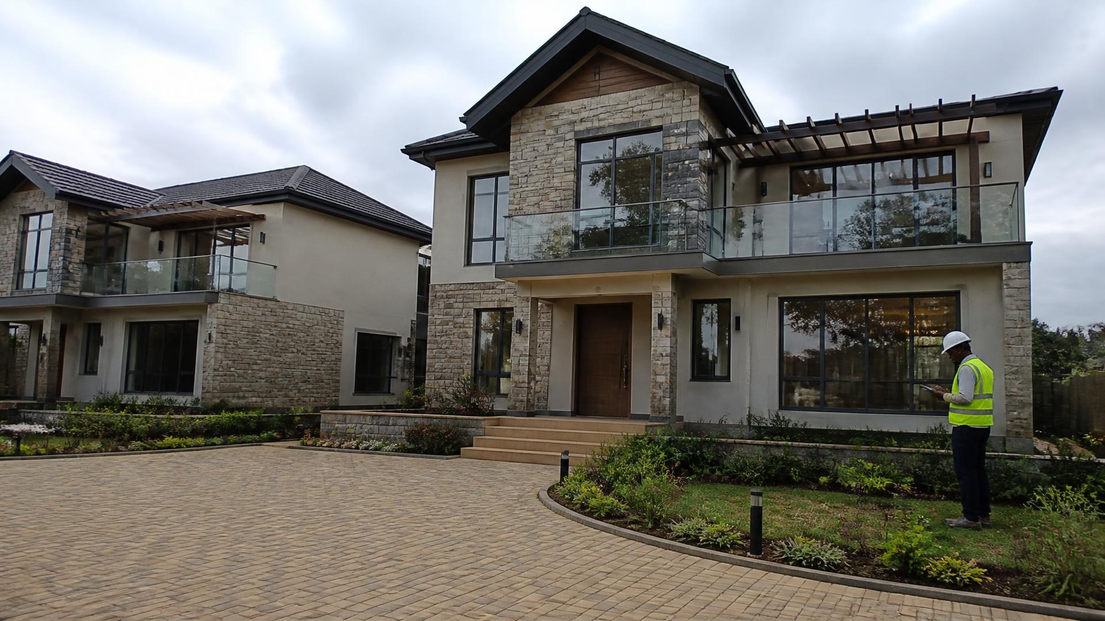Project-aligned construction imagery for Legacy Ridges — two show houses, Kiambu