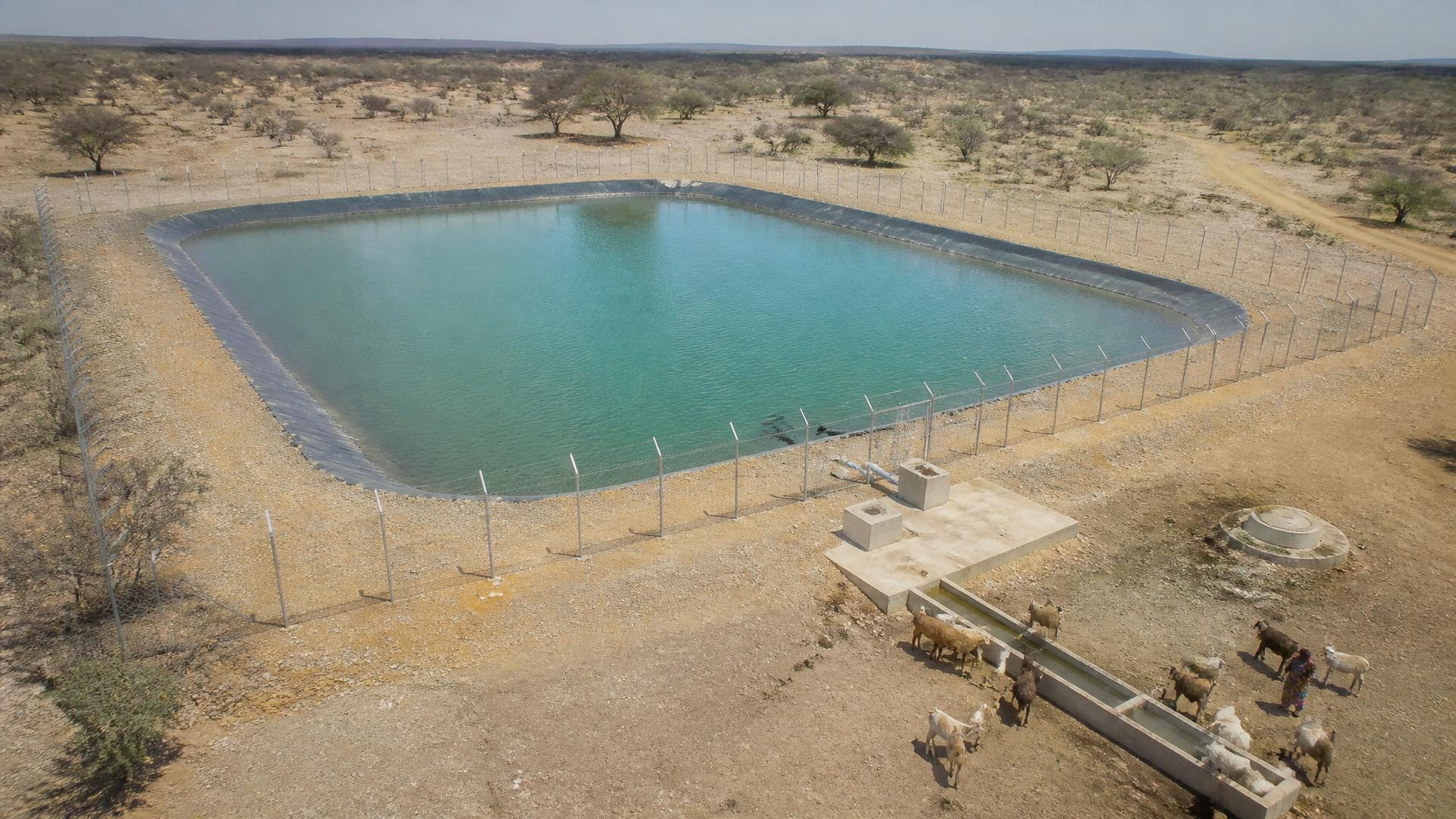 Project-aligned construction imagery for Amref / WaterFund — 30,000m³ Naremieto Water Pan, Turkana